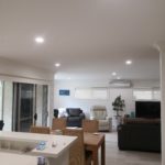 Residential electrician installs LED downlights